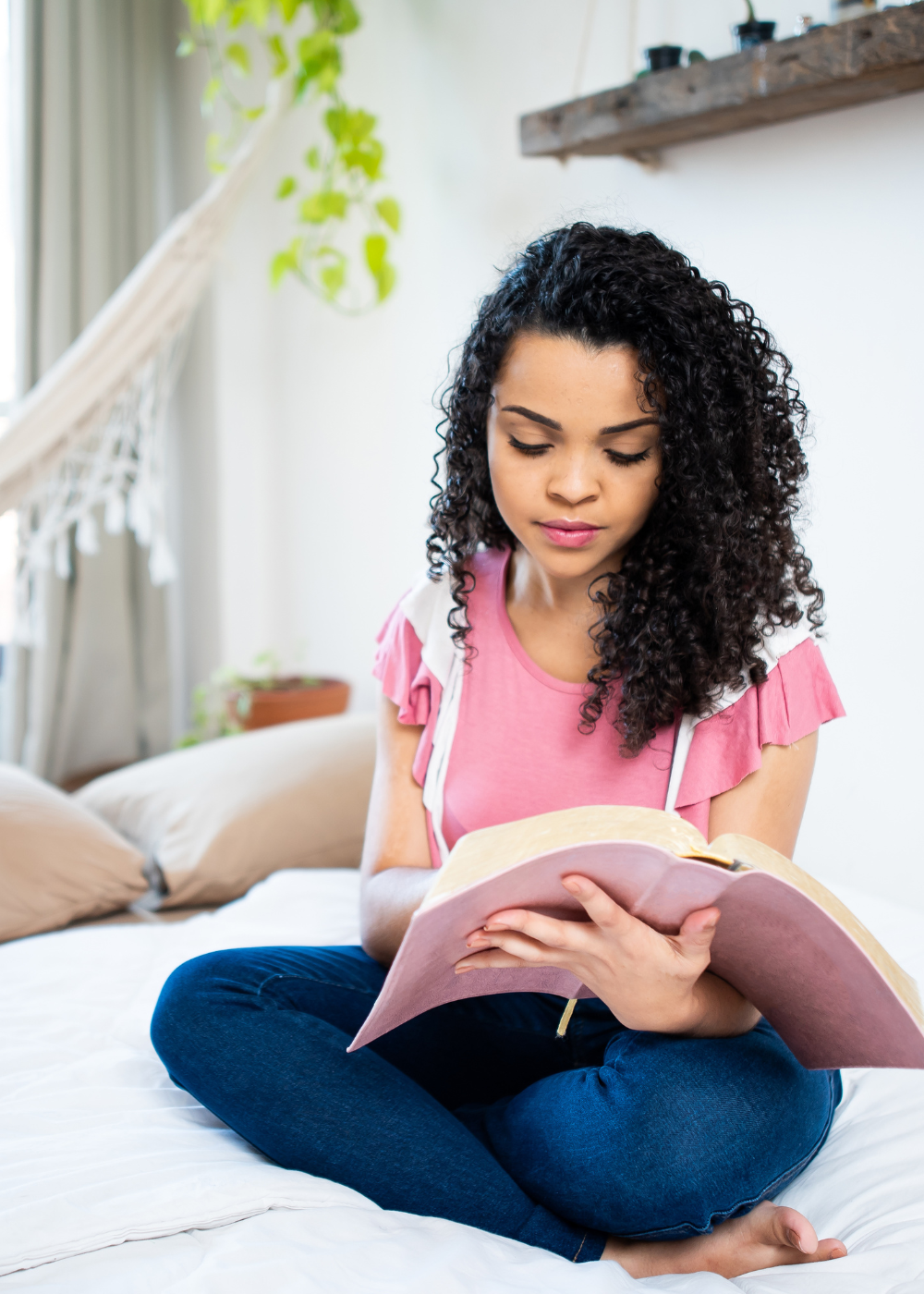 mixed woman reading the bible