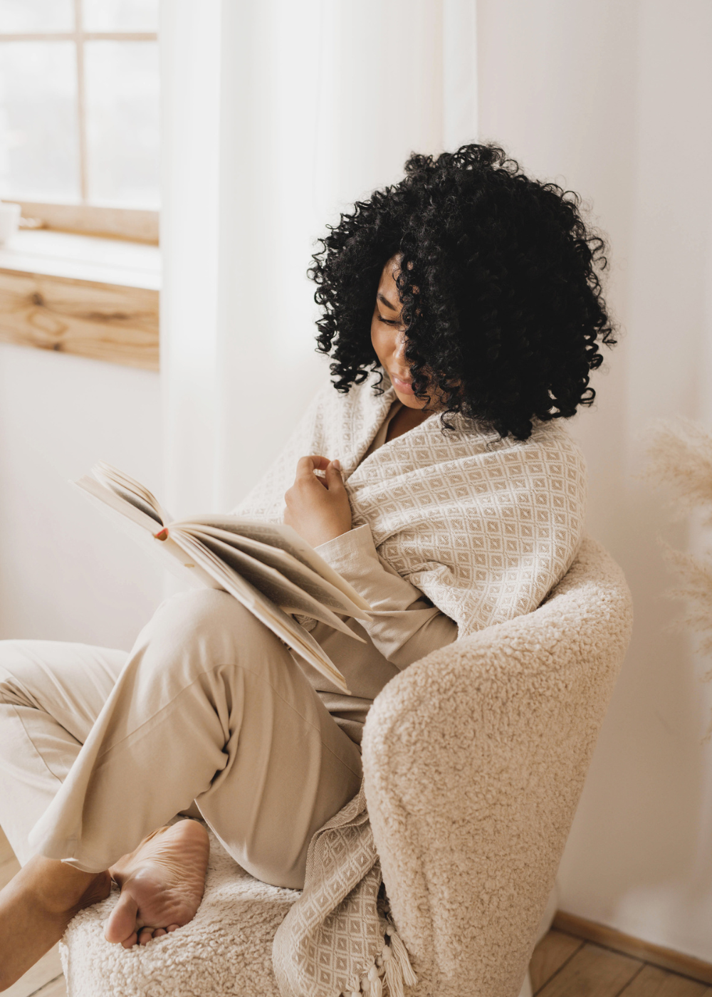 african american woman reading a book